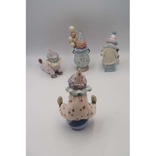 435 - A Lladro figure 'Having a Ball' clown, figure 5811 'Little Clown' figure 58120 'Tired Friend', Piero... 