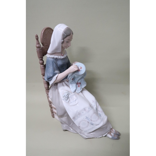 438 - A Lladro figurine Embroidery 4865, 29.5cm high