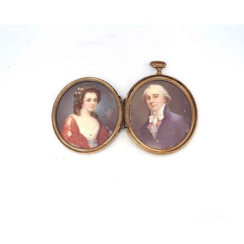 456 - A pair of miniature portraits in an oval silver gilt and tortoiseshell mounted oval twin frame, the ... 