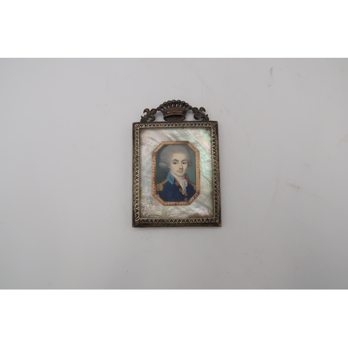 457 - A late 18th century miniature portrait of a gentleman mounted in a gilt frame in a gold coloured can... 