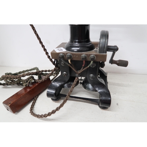 470 - A vintage cast iron Ericsson skeleton telephone. Missing Horn. 30cm high.