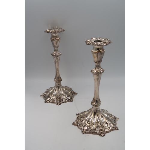 473 - A pair of brass extendable candlesticks marked F and Co. and a pair of silver plated candlesticks wi... 