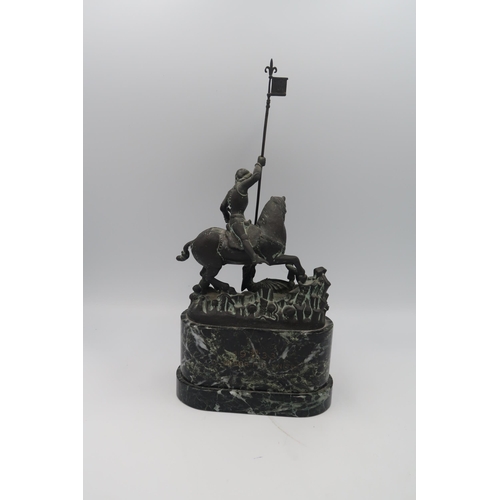 475 - A Bronze sculpture of St George and the Dragon After Bohuslav Schmirch (1845-1901) 28cm high.