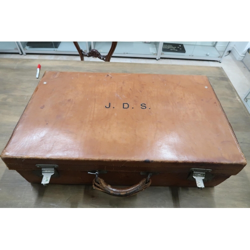 476 - A Leather Travel Case with part fitted interior. 39cm x 66cm x 18cm high.