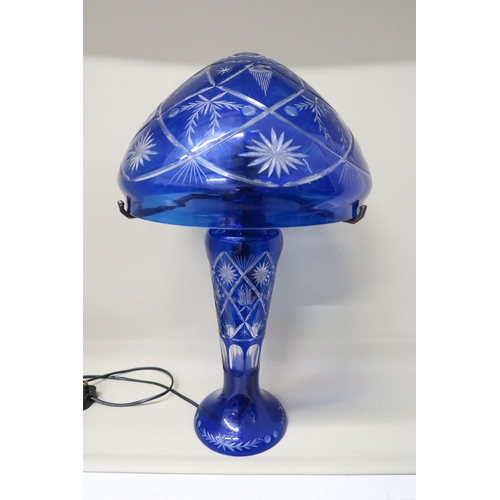 484 - A Bohemian blue cut glass table lamp approx. 56cm high