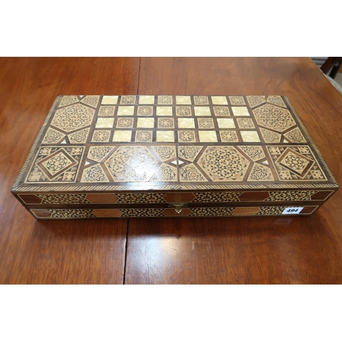 494 - A vintage backgammon games box by Jackpot