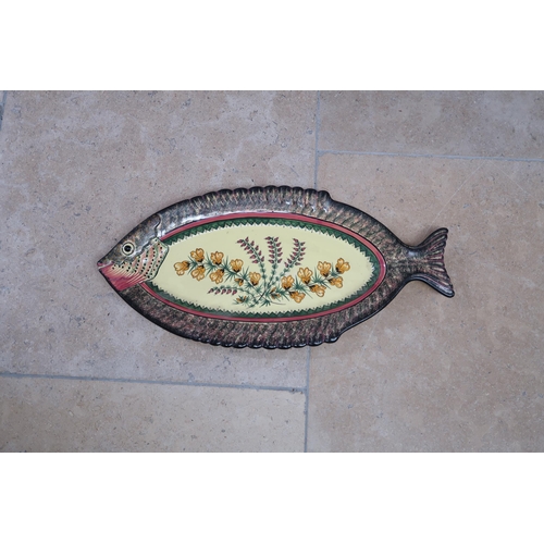 507 - Two French Quimper dishes, both fish and fishing themed, each 61cm long.