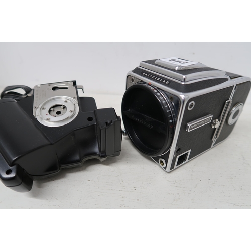 513 - A Hasselblad 2000 FC/M with grip, suitable for spares.