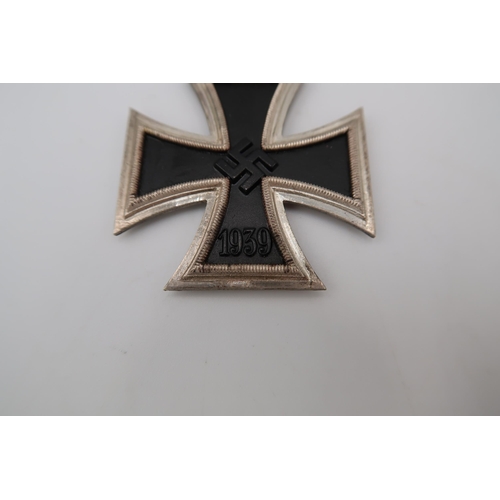 542A - Third Reich Iron Cross, 2nd Class. A good clean example of this non-maker award, retaining all finis... 