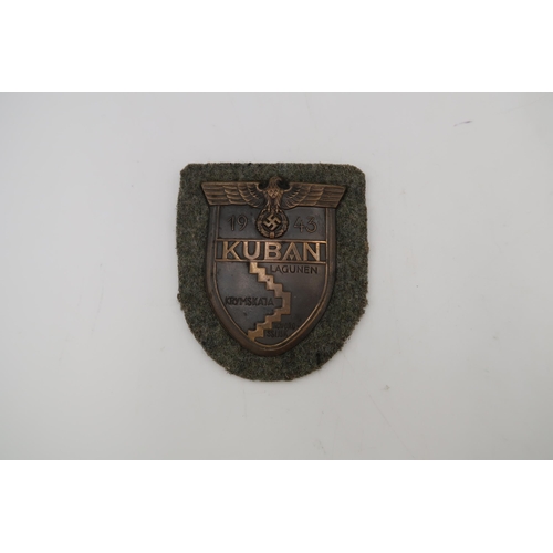 548A - A Third Reich Kuban Campaign Shield, with original finish, and black paper backing, shield attached ... 