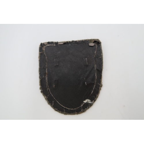 548A - A Third Reich Kuban Campaign Shield, with original finish, and black paper backing, shield attached ... 