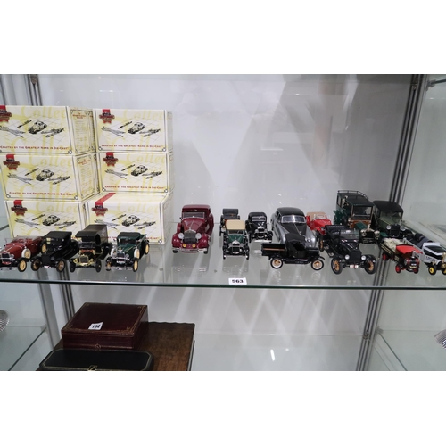 563 - A selection of franklin mint and Matchbox Scale models of vehicles. Models include Rolls Royce, M.G.... 