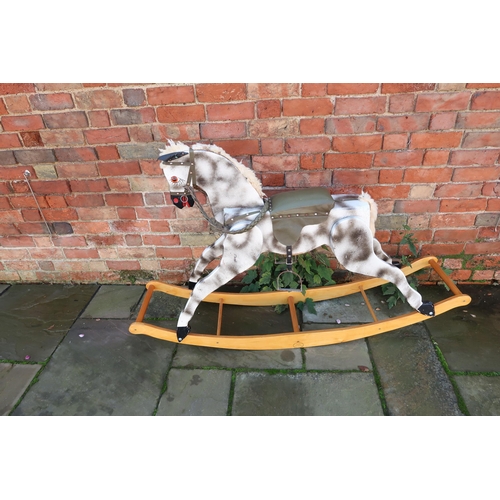 565 - A vintage PC and R Schday Rocking Horse, dapple grey with green saddle and bridle, on bow rocker, 1.... 