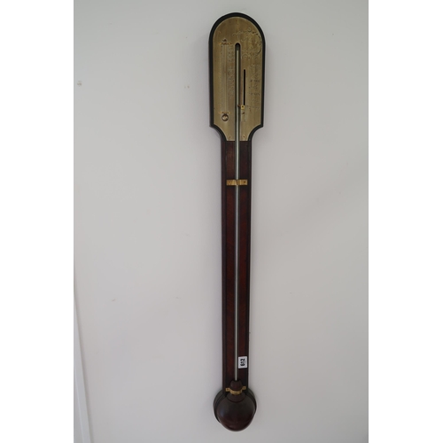 612 - A 19th Century mahogany stick Barometer with a brass dial by J. Corti of London 96cm high - Mercury ... 