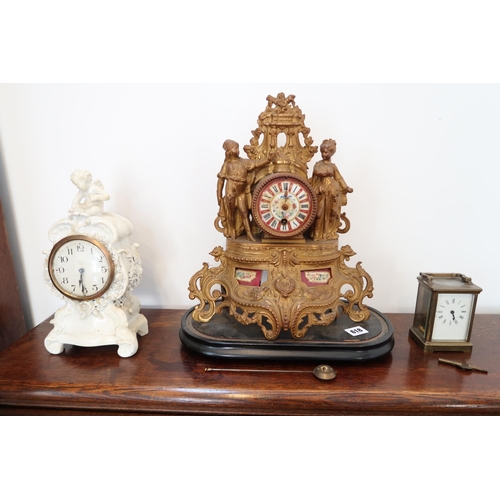 618 - A carriage clock, a French ormulu clock and a mantle clock.