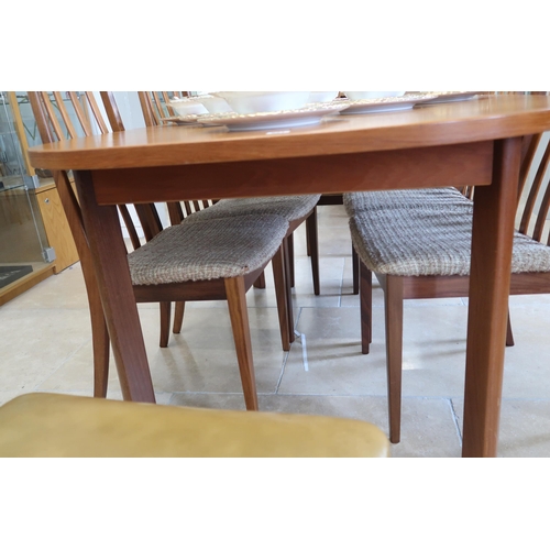 621 - A mid 20th century teak G-plan extending dining table and six chairs, 73cm high, 107cm wide x 152.5c... 