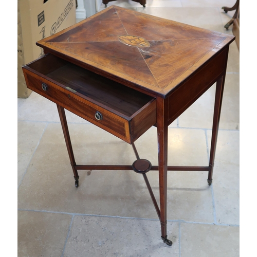 624 - A Georgian Satinwood occasional table with shell inlay to top on slender legs with brass caps and ca... 