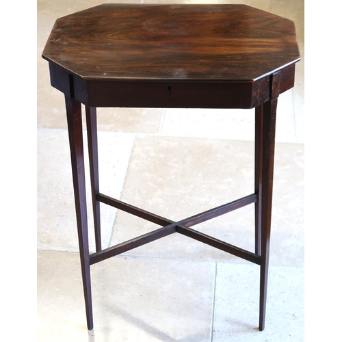 628 - A 19th century mahogany table with a rising top and lift out tray on slender supports 52cm high.