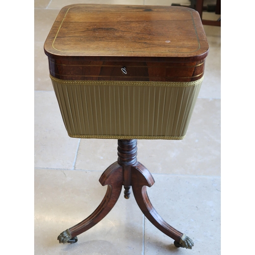 629 - A 19th century Rosewood and Brass inlaid workbox on three out swept legs. 75cm high.