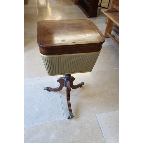 629 - A 19th century Rosewood and Brass inlaid workbox on three out swept legs. 75cm high.