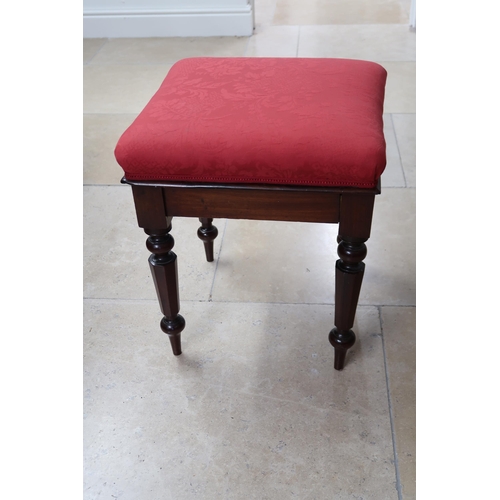 630 - A mahogany stool with red upholstered overstuffed seat, 48cm x 48cm x 57cm high