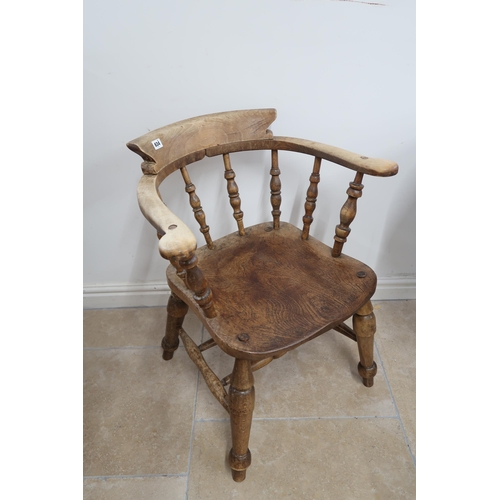 634 - A smokers bow chair raised on turned supports joined by an H stretcher, circa late 19th century, 76c... 