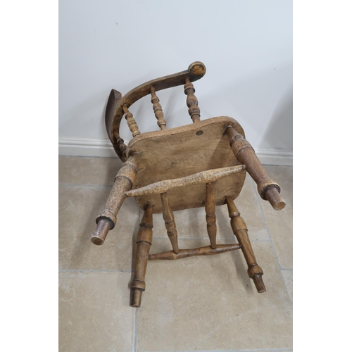 634 - A smokers bow chair raised on turned supports joined by an H stretcher, circa late 19th century, 76c... 