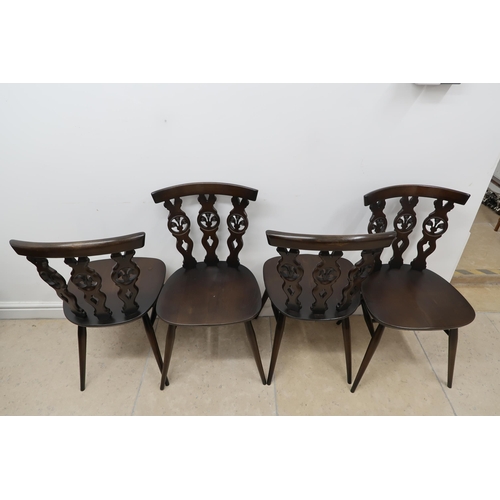 715 - A Set of four Ercol dining chairs. (In good condition).