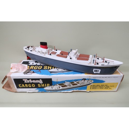 561 - A Tri-ang Cargo ship powered with long running clockwork marine power unit. (Boxed and in working co... 