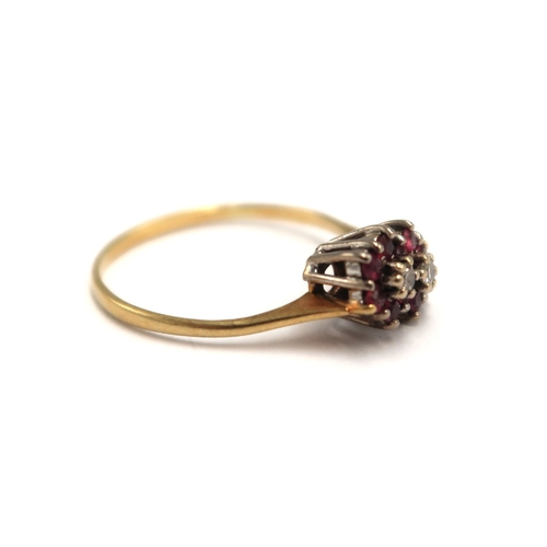  An 18ct yellow gold hallmarked  diamond and garnet dress ring size P 1/2 - approx weight 2.3 grams