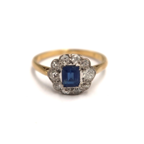 An 18ct yellow gold (tested) diamond and sapphire dress ring size O/P - weight approx 2.6 grams