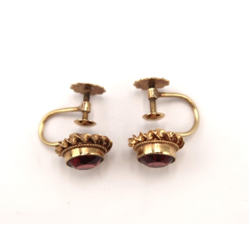  A pair of 9ct hallmarked yellow gold and garnet earrings - approx weight 2.2 grams