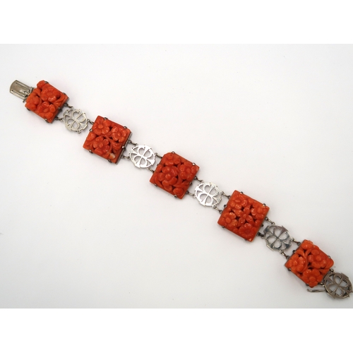  A 9ct white gold and coral bracelet - total weight approx 21.5 grams