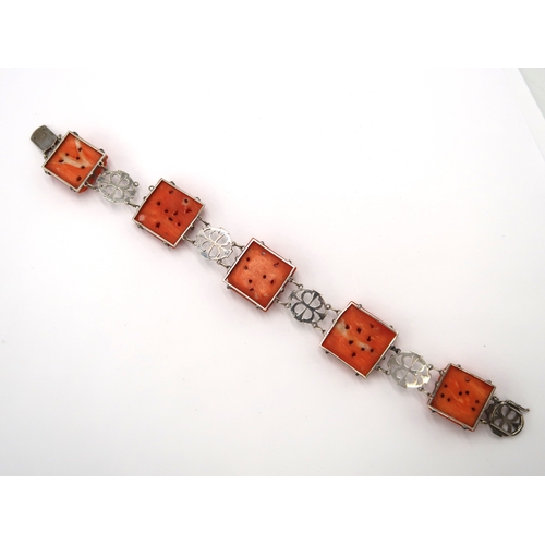  A 9ct white gold and coral bracelet - total weight approx 21.5 grams