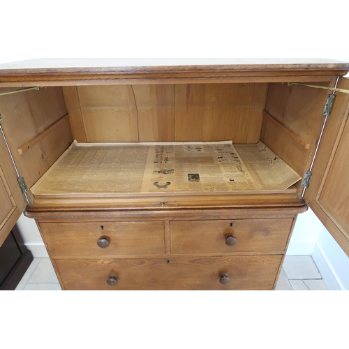 675 - A good 19th century ash cupboard over chest in original condition, 138 by 107cm.