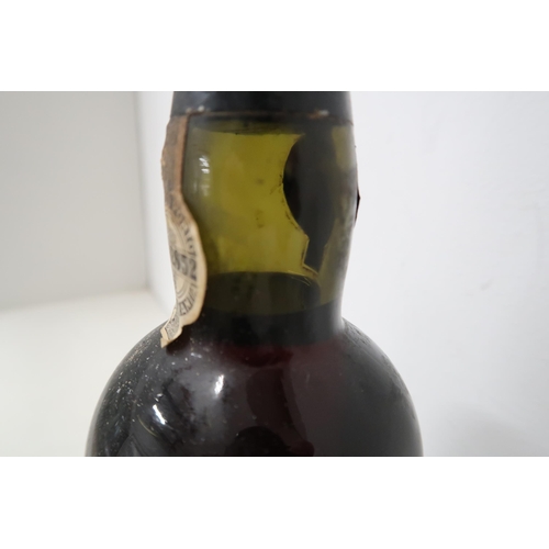 435 - A 75cl bottle of Noval 1961 crusted Port