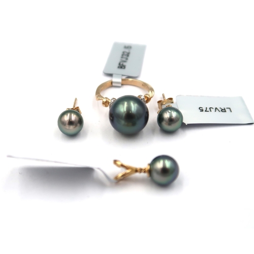 164 - An 18ct gold Tahitian cultured pearl and brilliant cut diamond pendant. Weight 1.41 grams. Together ... 