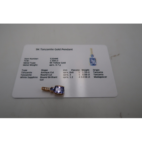 105 - A 9ct gold tanzanite and diamond pendant. Weight 1.07 grams