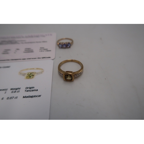 119 - Two 9ct rings. To include a yellow tanzanite with diamond shoulders, size O. An oval tanzanite three... 