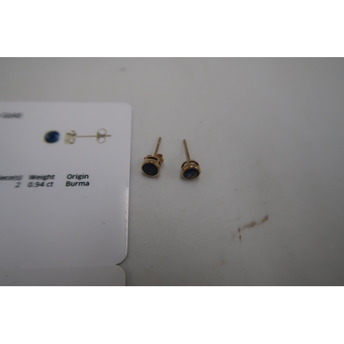 123 - A 9ct gold sapphire five stone ring, size O. Together with 9ct sapphire ear studs. Weight