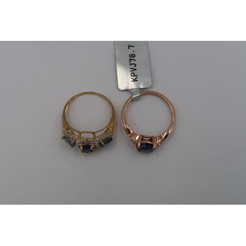 129 - Two 9ct gold kyanite and diamond rings. To include a three stone ring size O and an openwork three s... 