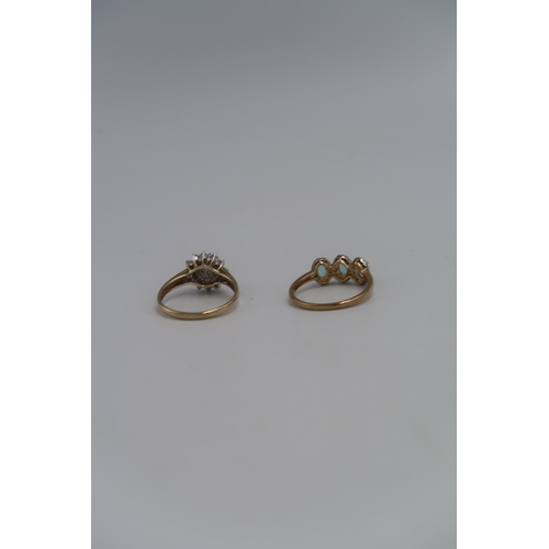 138 - Two marked m.375 Yellow gold dress rings, one three stone Topaz surrounded by small cut diamonds Siz... 