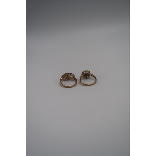 148 - Two marked .375 Yellow gold dress rings, one set with three different coloured gems Size t and one s... 