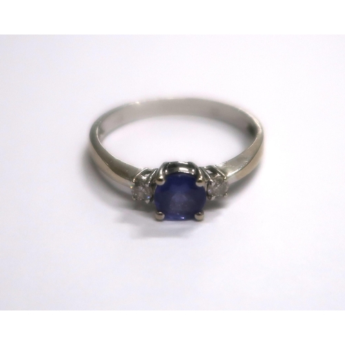 154 - A 14ct white gold Tanzanite ring - approx 0.65ct with receipt for $525 Dollars