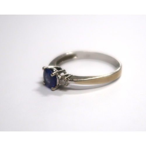 154 - A 14ct white gold Tanzanite ring - approx 0.65ct with receipt for $525 Dollars