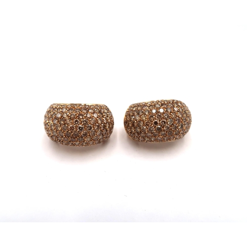 166 - A pair of brilliant cut diamond pave set ear loops, estimated total diamond weight 6.60cts, tests go... 