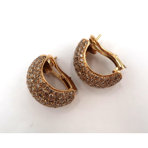 166 - A pair of brilliant cut diamond pave set ear loops, estimated total diamond weight 6.60cts, tests go... 