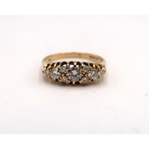 170 - An 18ct gold navette shape diamond ring, diamonds are a very good colour and clarity and well matche... 