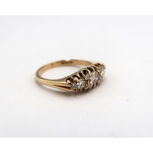 170 - An 18ct gold navette shape diamond ring, diamonds are a very good colour and clarity and well matche... 