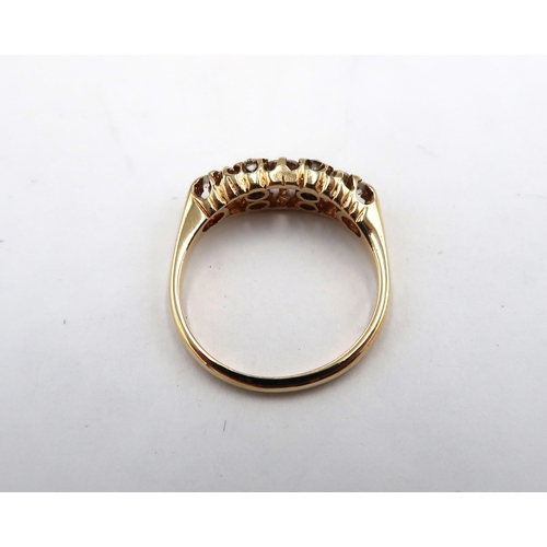 170 - An 18ct gold navette shape diamond ring, diamonds are a very good colour and clarity and well matche... 